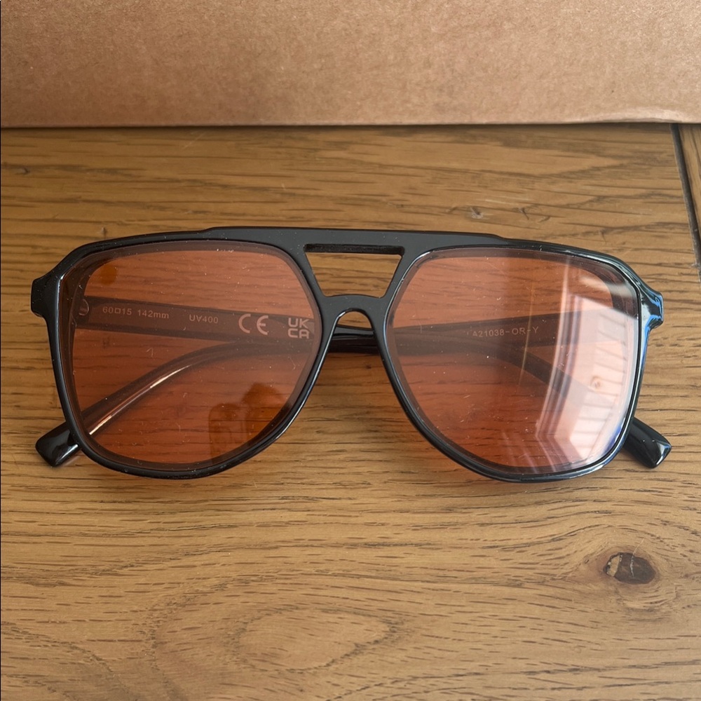 Black Sunglasses with Orange Lenses